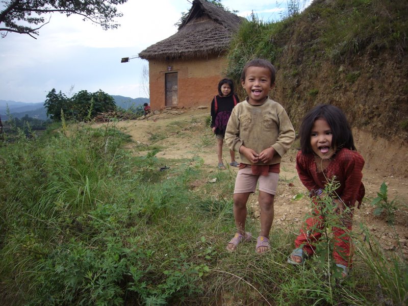 The local kids like to have their picture taken.